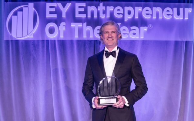 Shane Jackson on stage accepting award for EY Entrepreneur of the Year